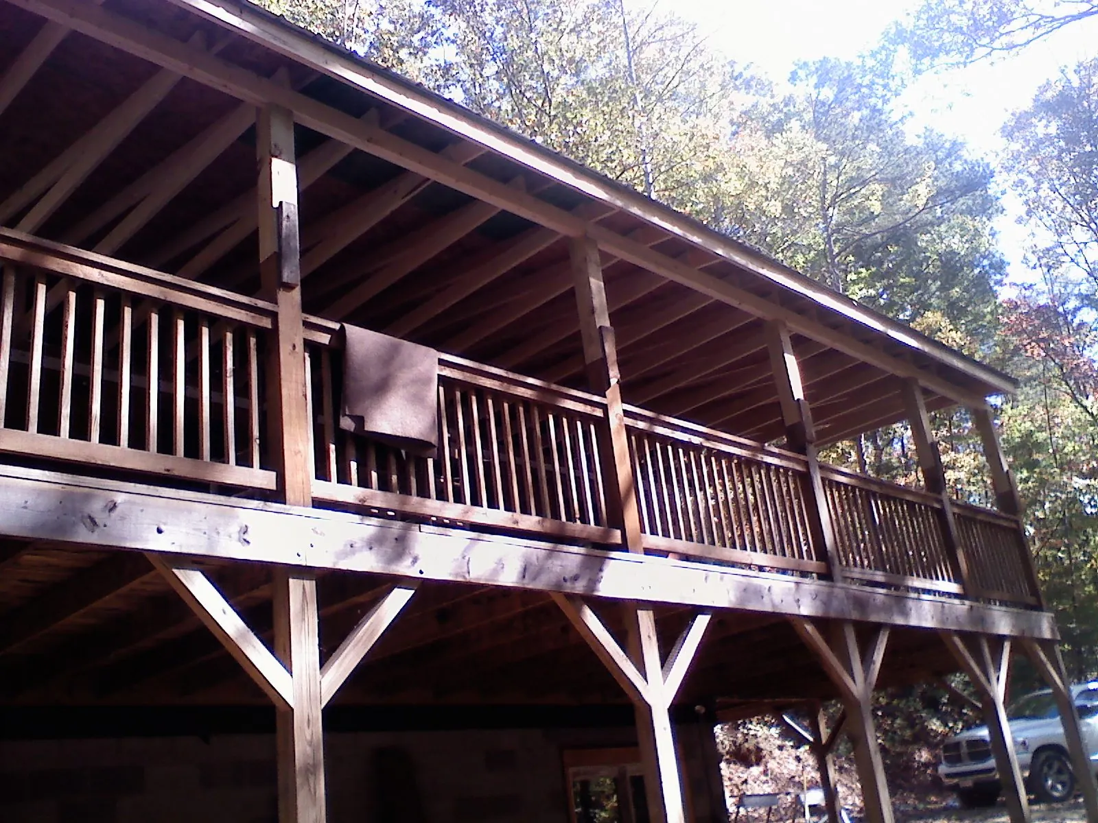 Timber framing under a new elevated porch and deck — Roof Leak Repair in Easthampton by Roofing Brothers
